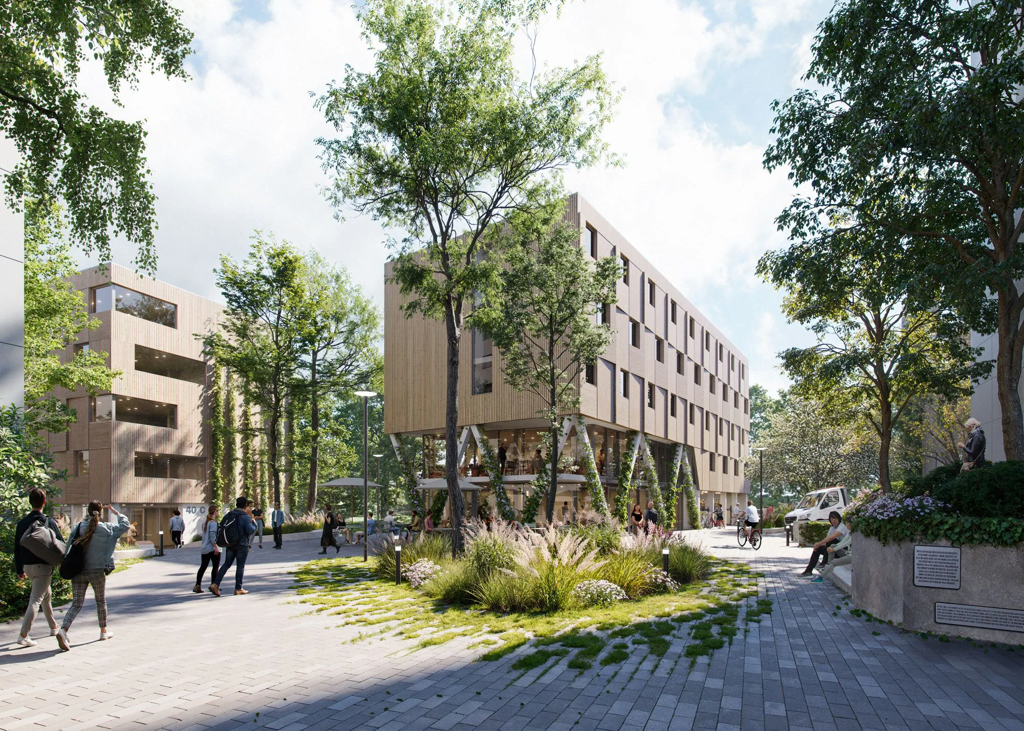 Der zentrale Platz mit den Studierendenwohnheimen in Hybrid-Modulbauweise