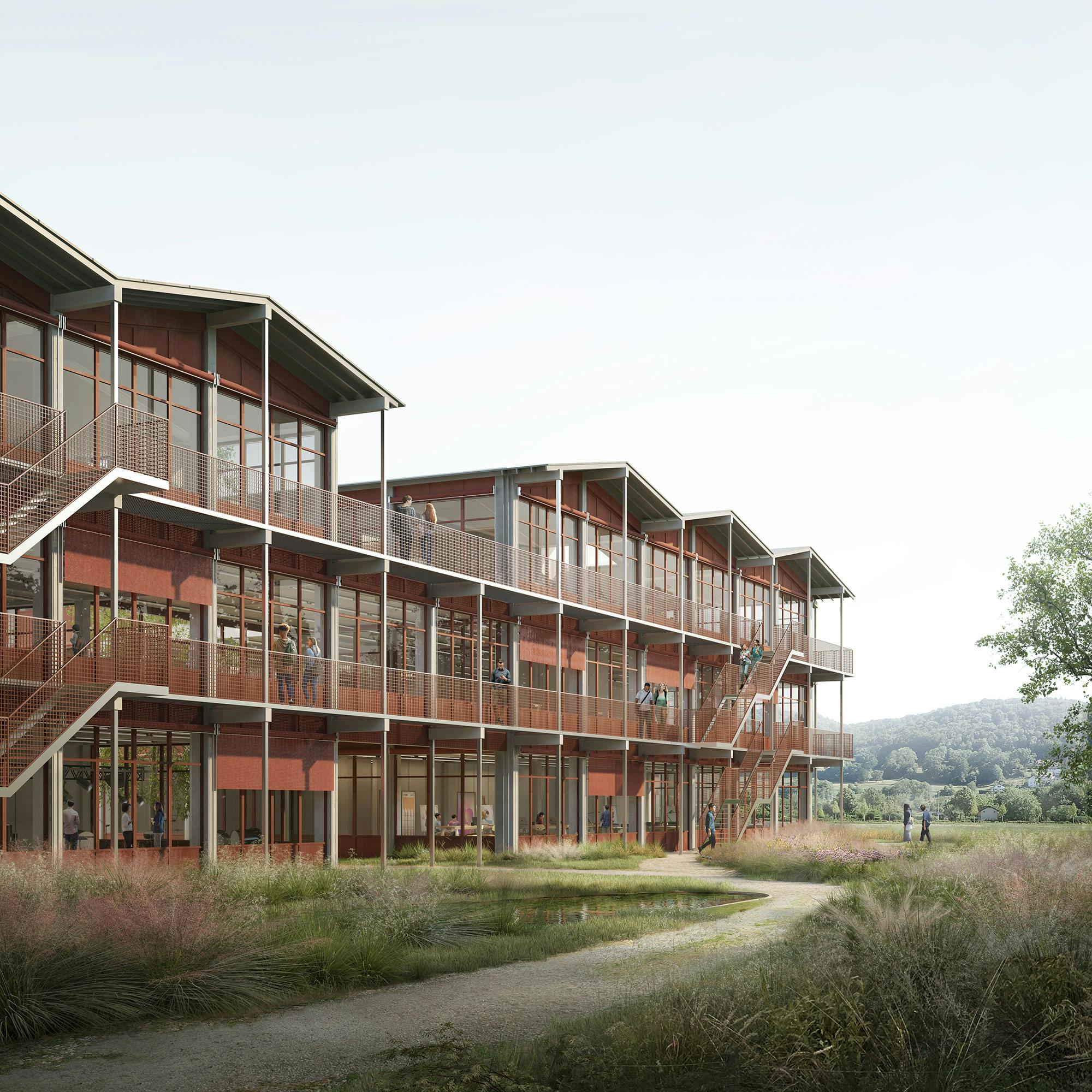 Aussenansicht. Das Schulhaus ist als Holz-Beton-Hybrid-Bau konzipiert.